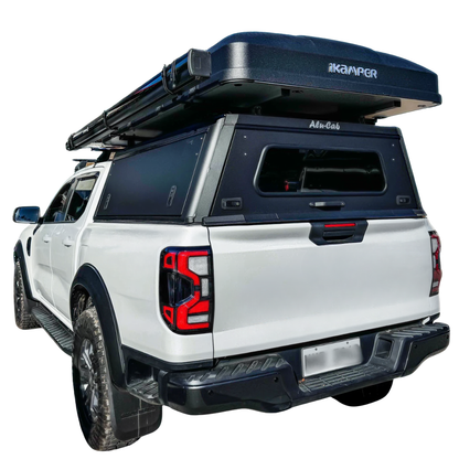 Toit rigide en aluminium Alu-Cab Explorer 3 pour Nissan Navara NP300 D23 2016+, montage solide et design robuste.