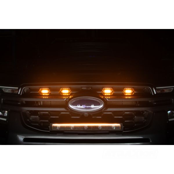 Éclairage LED Shadow Vision EEZEE POWER sur calandre avant, 3 couleurs, design moderne pour voiture.